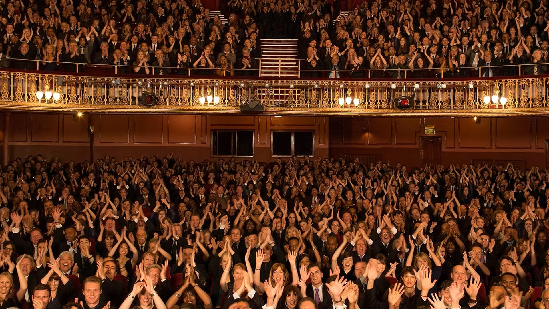 Theatre audience applauding in an ornate auditorium (Your Theatre Breaks)